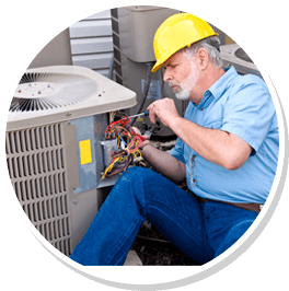 man repairing ac